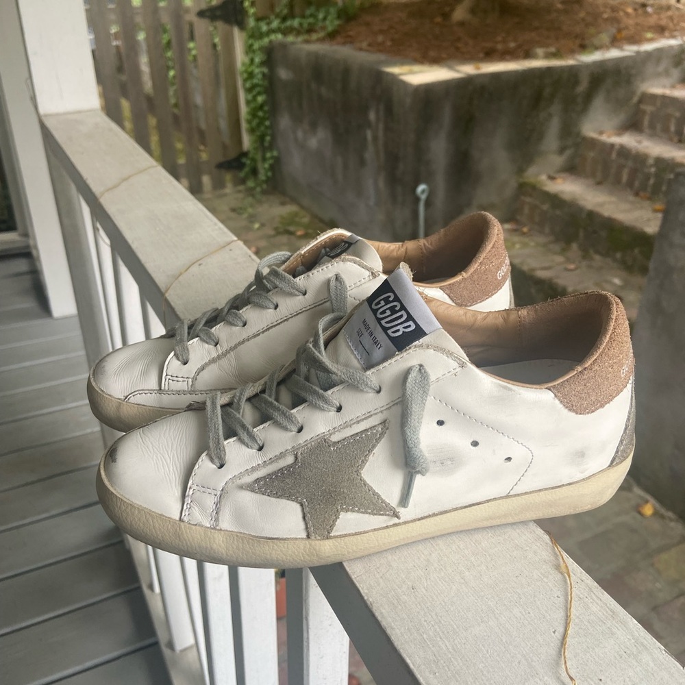 Neutral white and tan Golden Goose Superstars. Lightly warn, great condition